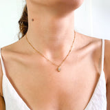 Mother of pearl gold necklace, made with high quality stainless steel worn